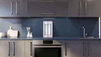 Blue kitchen with gray countertops